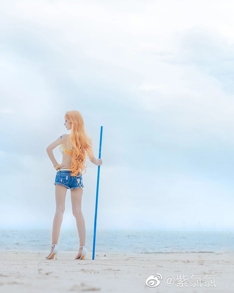 คอสเพลย์ Nami จาก ONE PIECE ในชุดส้มสดใส 9 คอสเพลย์ Nami จาก ONE PIECE ในชุดส้มสดใส