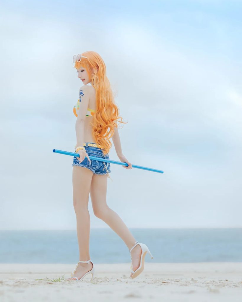 คอสเพลย์ Nami จาก ONE PIECE ในชุดส้มสดใส 10 คอสเพลย์ Nami จาก ONE PIECE ในชุดส้มสดใส