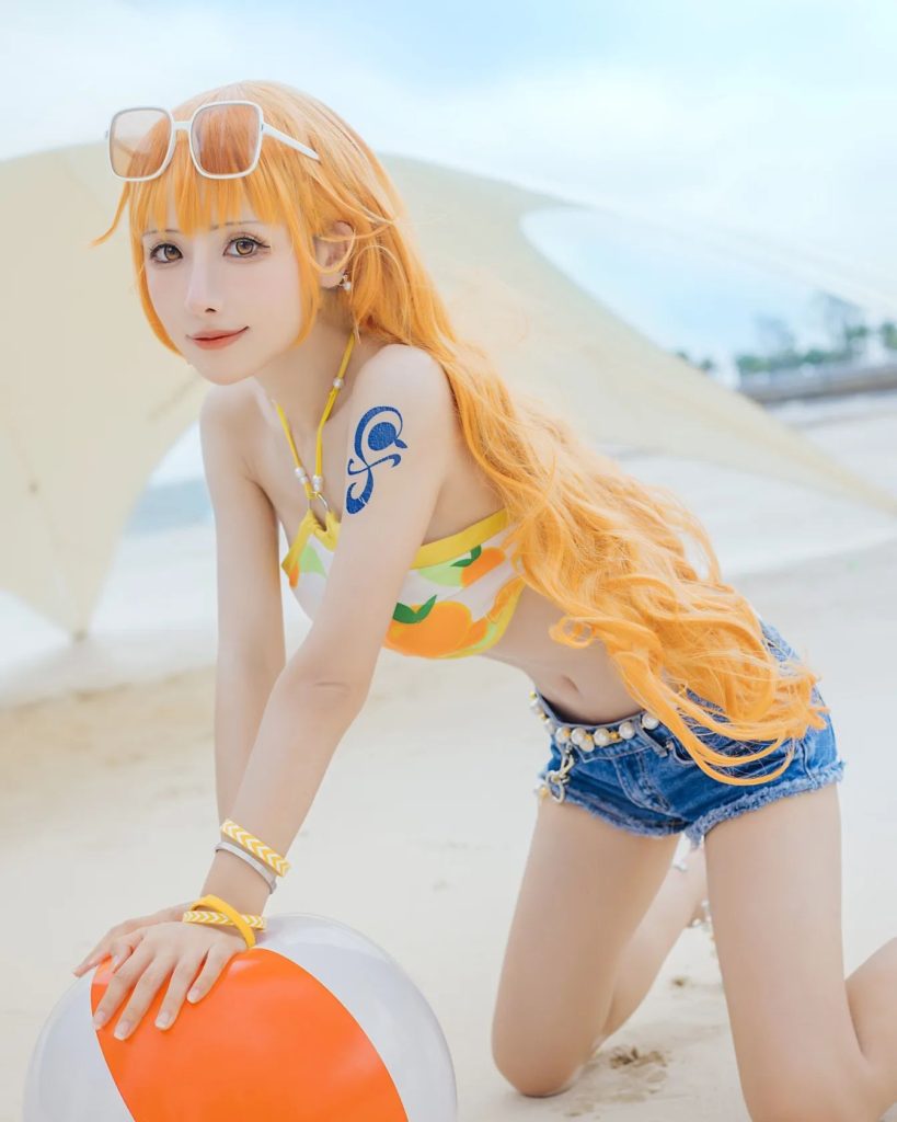 คอสเพลย์ Nami จาก ONE PIECE ในชุดส้มสดใส 7 คอสเพลย์ Nami จาก ONE PIECE ในชุดส้มสดใส