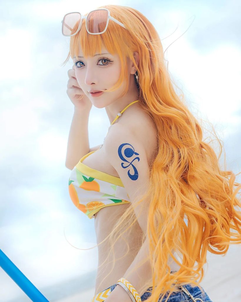 คอสเพลย์ Nami จาก ONE PIECE ในชุดส้มสดใส 4 คอสเพลย์ Nami จาก ONE PIECE ในชุดส้มสดใส