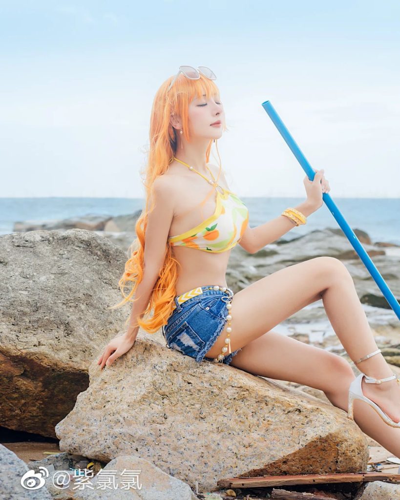 คอสเพลย์ Nami จาก ONE PIECE ในชุดส้มสดใส 8 คอสเพลย์ Nami จาก ONE PIECE ในชุดส้มสดใส