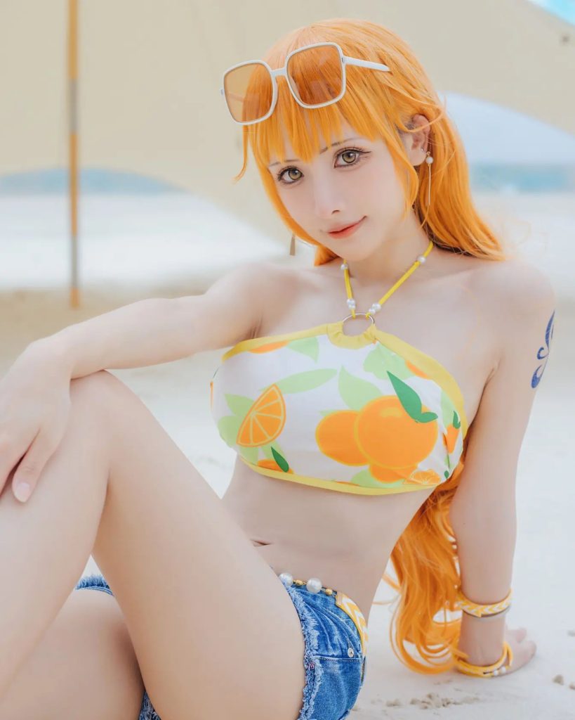 คอสเพลย์ Nami จาก ONE PIECE ในชุดส้มสดใส 5 คอสเพลย์ Nami จาก ONE PIECE ในชุดส้มสดใส