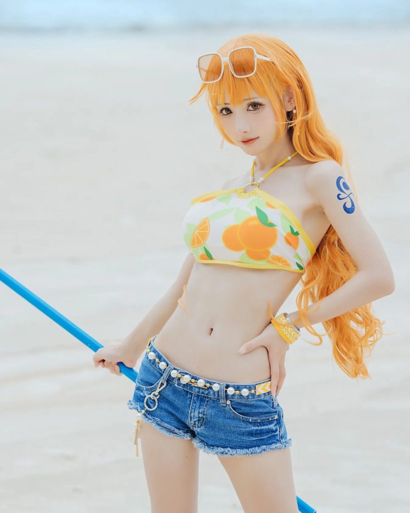 คอสเพลย์ Nami จาก ONE PIECE ในชุดส้มสดใส 6 คอสเพลย์ Nami จาก ONE PIECE ในชุดส้มสดใส