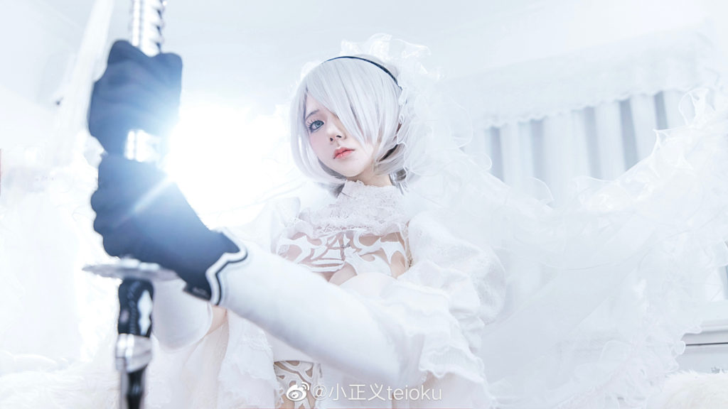 คอสเพลย์ 2B จาก NieR: Automata ในชุดกึ่งแต่งงานสีขาวสุดเซ็กซี่ 2 คอสเพลย์ 2B จาก NieR: Automata ในชุดกึ่งแต่งงานสีขาวสุดเซ็กซี่