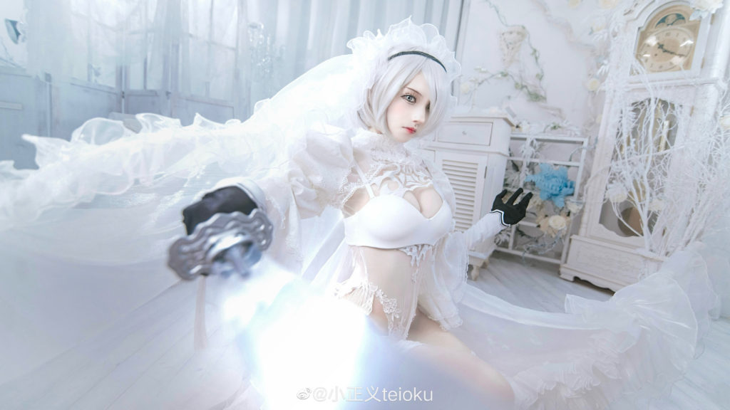 คอสเพลย์ 2B จาก NieR: Automata ในชุดกึ่งแต่งงานสีขาวสุดเซ็กซี่ 9 คอสเพลย์ 2B จาก NieR: Automata ในชุดกึ่งแต่งงานสีขาวสุดเซ็กซี่